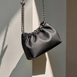 Nalandu Mini Dumpling Leather Clutch Crossbody Bag - Black