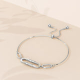 Bullion Gold Possession Diamonelle on Mother of Pearl Shell Adjustable Slider Bracelet Gold