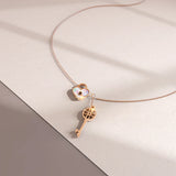 Bullion Gold Flower pattern key & lock in Rose Gold Layered Steel Jewellery