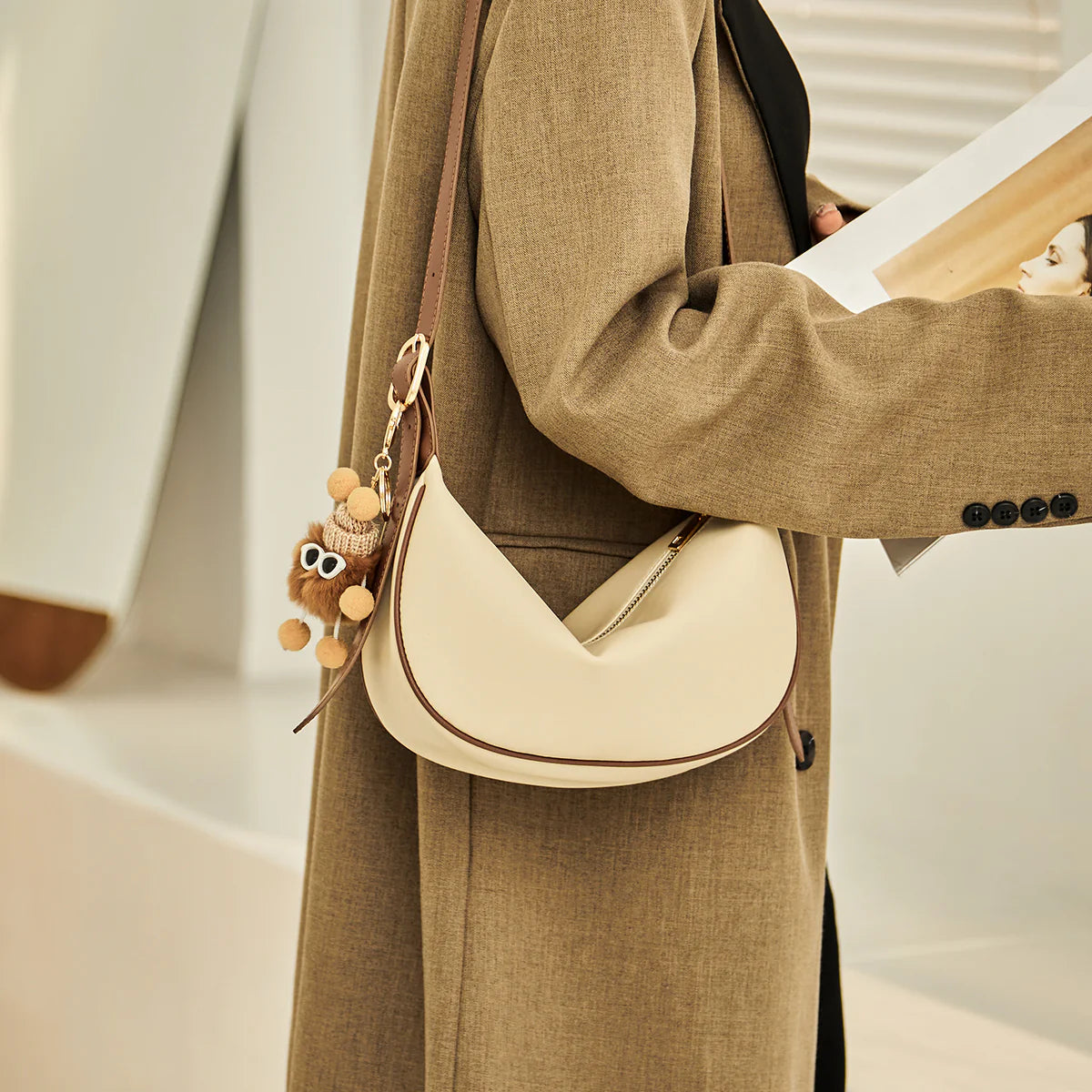 Nalandu Crescent Leather Crossbody Shoulder Bag with Bear Charm - Ivory
