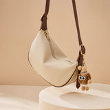 Nalandu Crescent Leather Crossbody Shoulder Bag with Bear Charm - Ivory