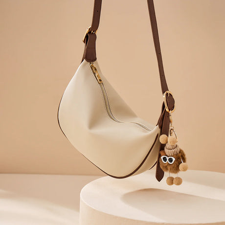 Nalandu Crescent Leather Crossbody Shoulder Bag with Bear Charm - Ivory