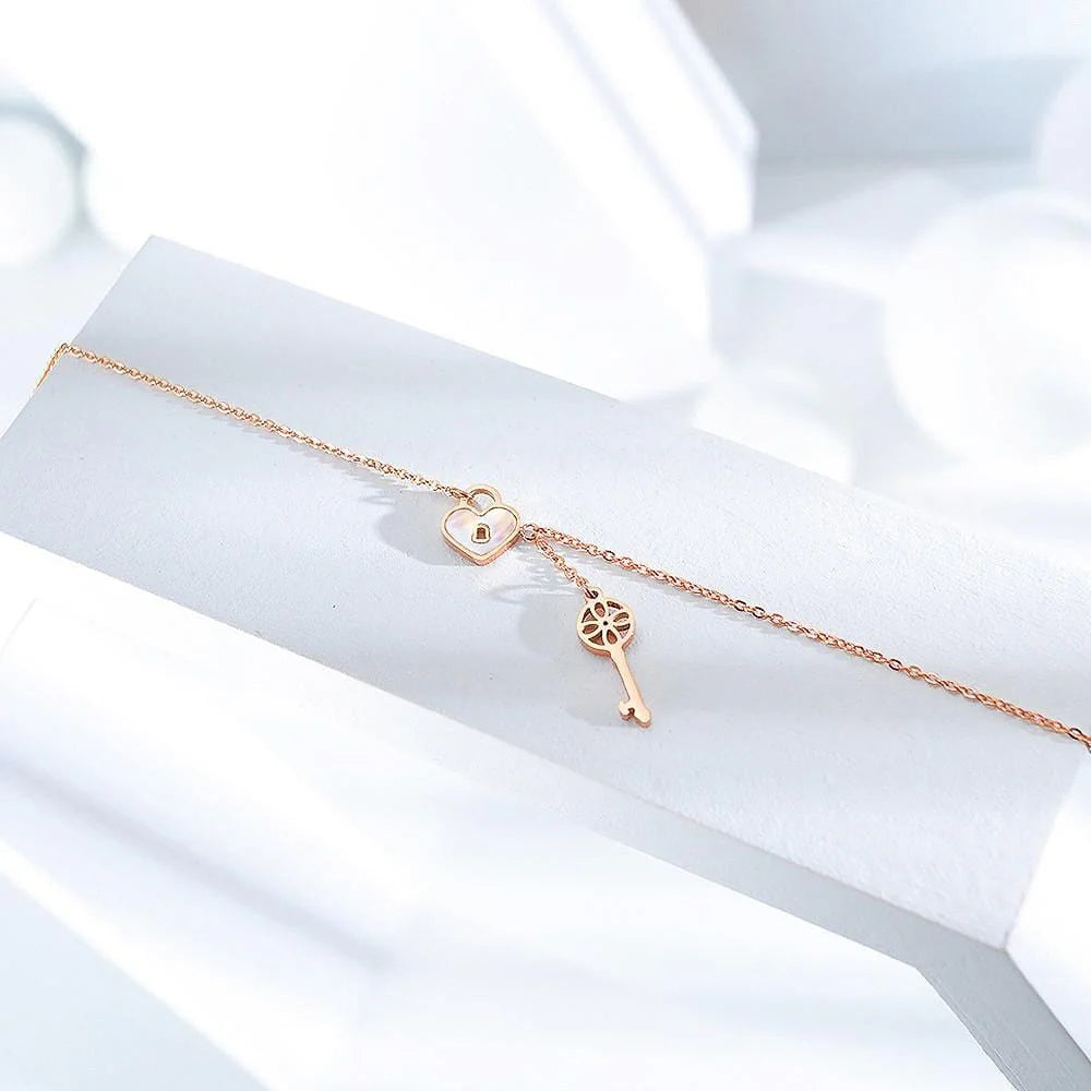 Bullion Gold Flower pattern key & lock in Rose Gold Layered Steel Jewellery