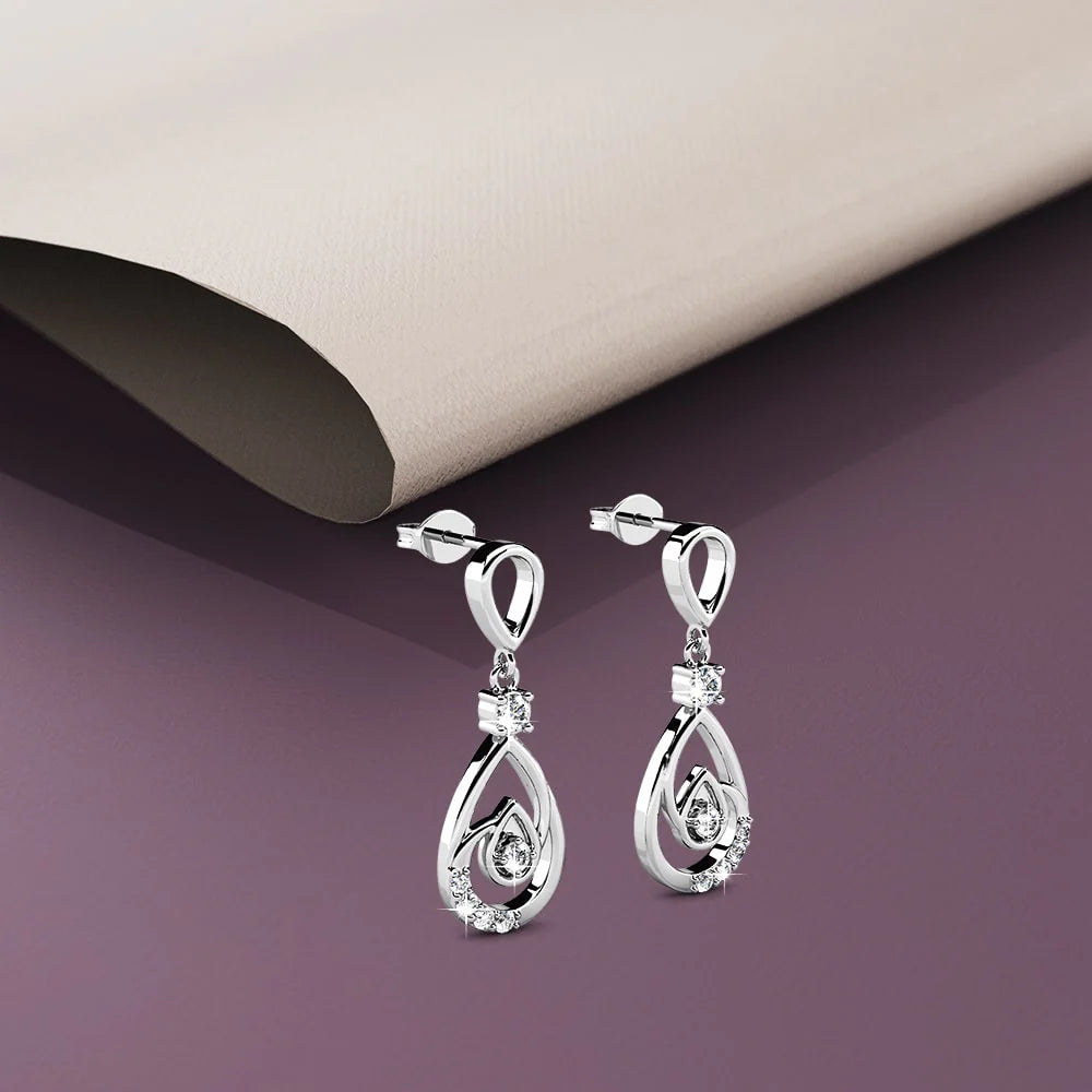 Krystal Couture Periwinkle Teardrop Earrings Embellished with Crystals from SWAROVSKI in White Gold