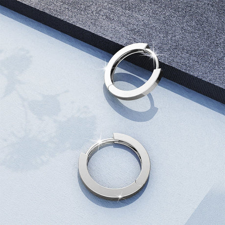 Solid 925 Sterling Silver Jerald Huggie Earrings in Silver
