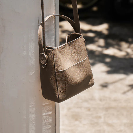 Nalandu Pebbled Leather Bucket Bag - Taupe