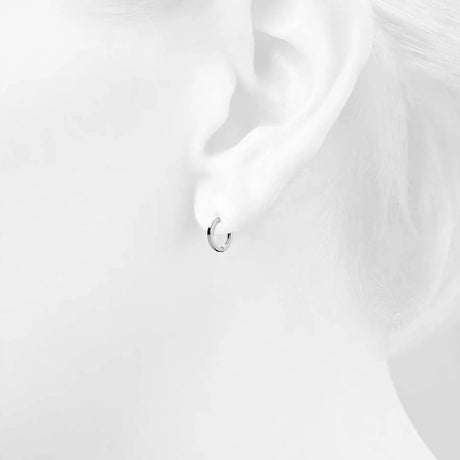 Solid 925 Sterling Silver Jerald Huggie Earrings in Silver