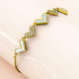 Bullion Gold Laurel Diamonelle Hearts on Mother of Pearl Shell Adjustable Slider Bracelet Gold