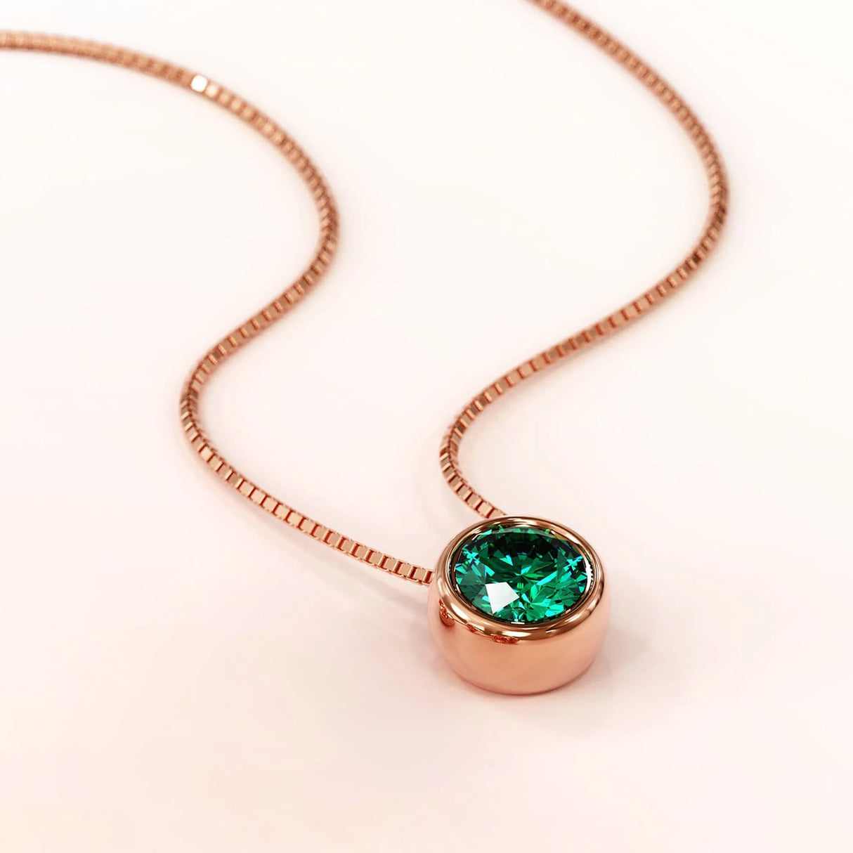 Krystal Couture Opulence Pendant Necklace Embellished with Emerald SWAROVSKI Crystals in Rose Gold