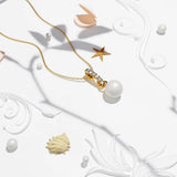 Krystal Couture Luminous Pearl Pendant Necklace in Gold Adorned with Crystals from Swarovski