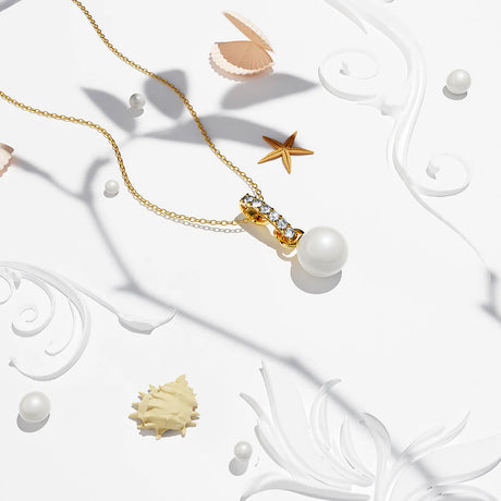 Krystal Couture Luminous Pearl Pendant Necklace in Gold Adorned with Crystals from Swarovski